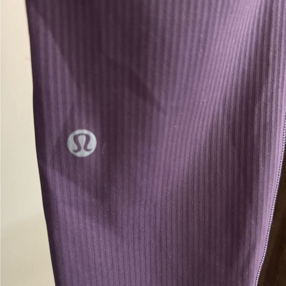 Like new Lululemon Wunder Train High-Rise Ribbed Tight 25"
Grape Thistle 8 - Picture 8 of 8